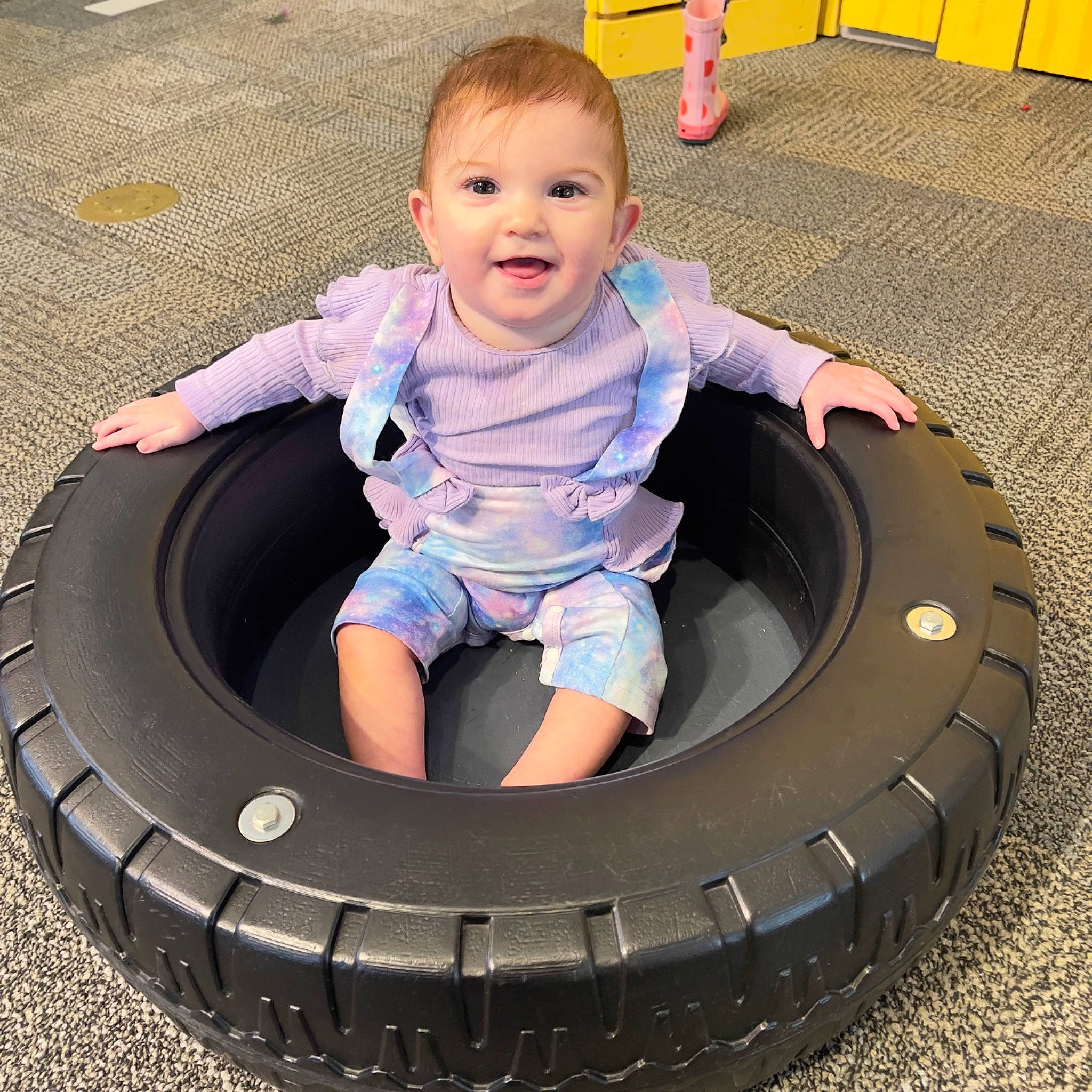 Zoë joined the competition — help win amazing prizes! auto_part, automotive_tire, automotive_wheel_system, baby_toddler_clothing, child, electric_blue, fun, hubcap, joy, leisure, organ, person, photograph, recreation, rim, smile, synthetic_rubber, tire, tire_care, toddler