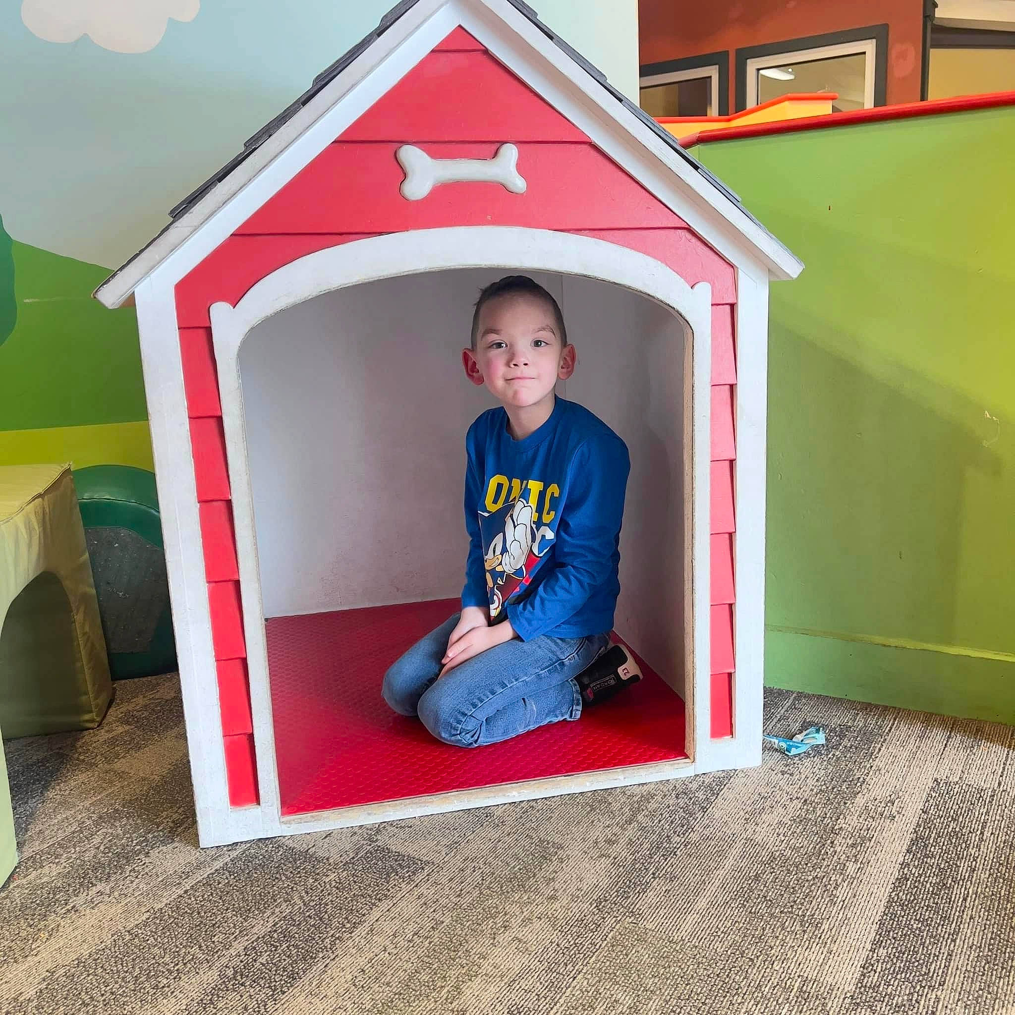 Corey joined the competition — help win amazing prizes! building, child, flooring, fun, house, leisure, outdoor_play_equipment, outerwear, person, play, playhouse, public_space, recreation, siding, sleeve, standing, t_shirt, toddler, tree, window