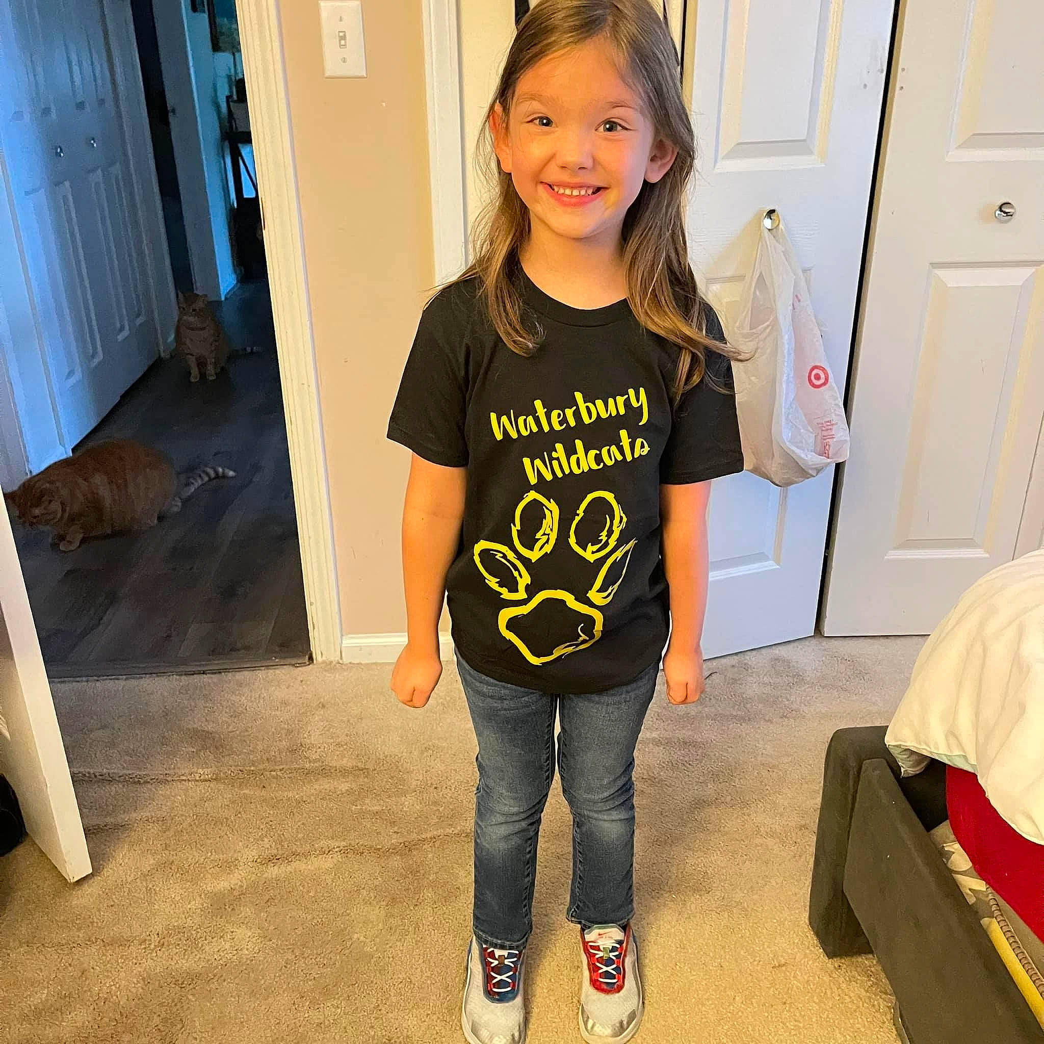 Corey is registered to the contest to win money with this photo: child, door, electric_blue, fashion, floor, flooring, fun, hair, hairstyle, happy, jeans, joint, joy, person, shoulder, sleeve, smile, sportswear, standing, t_shirt