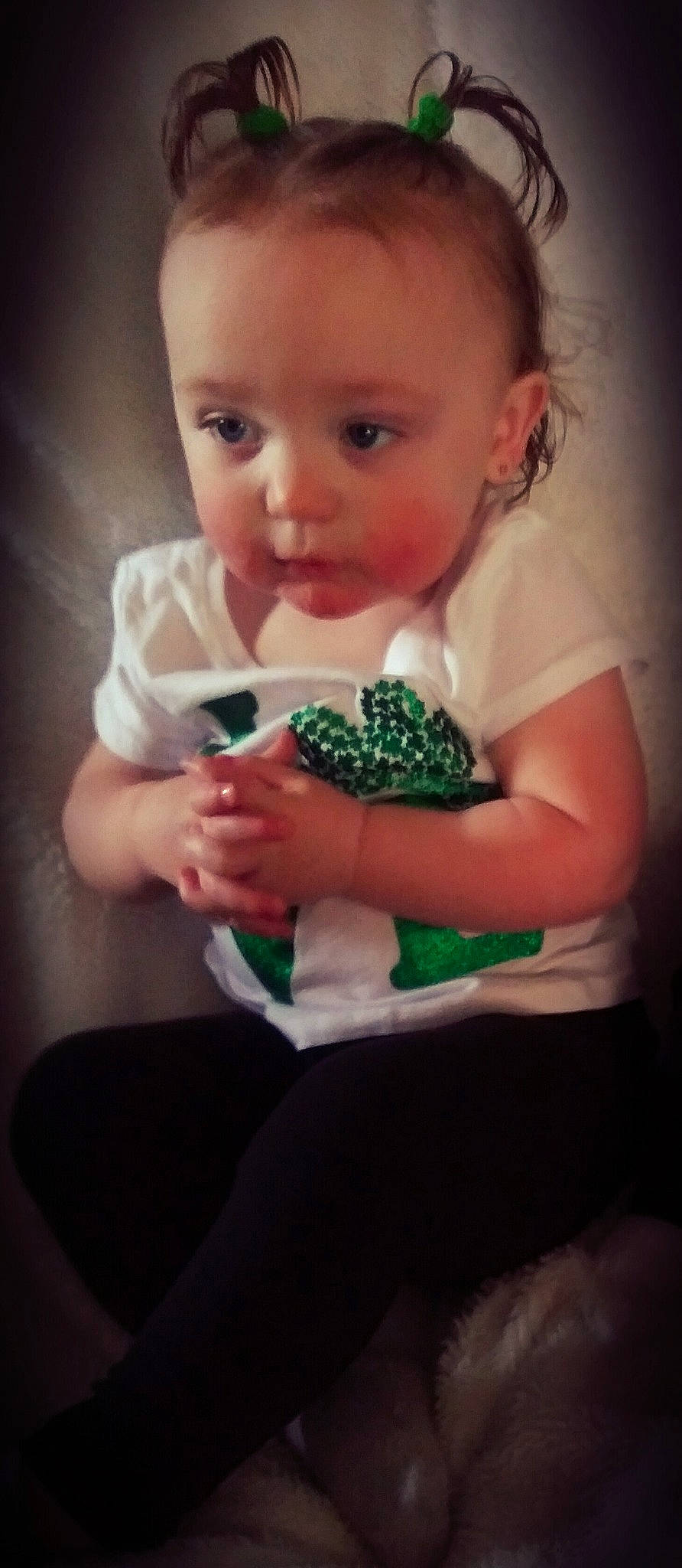 Kensington is registered to the contest to win money with this photo: arm, baby_toddler_clothing, cheek, eye, eyebrow, face, finger, fruit, gesture, hair, hand, happy, human_body, iris, lip, mouth, neck, nose, person, skin