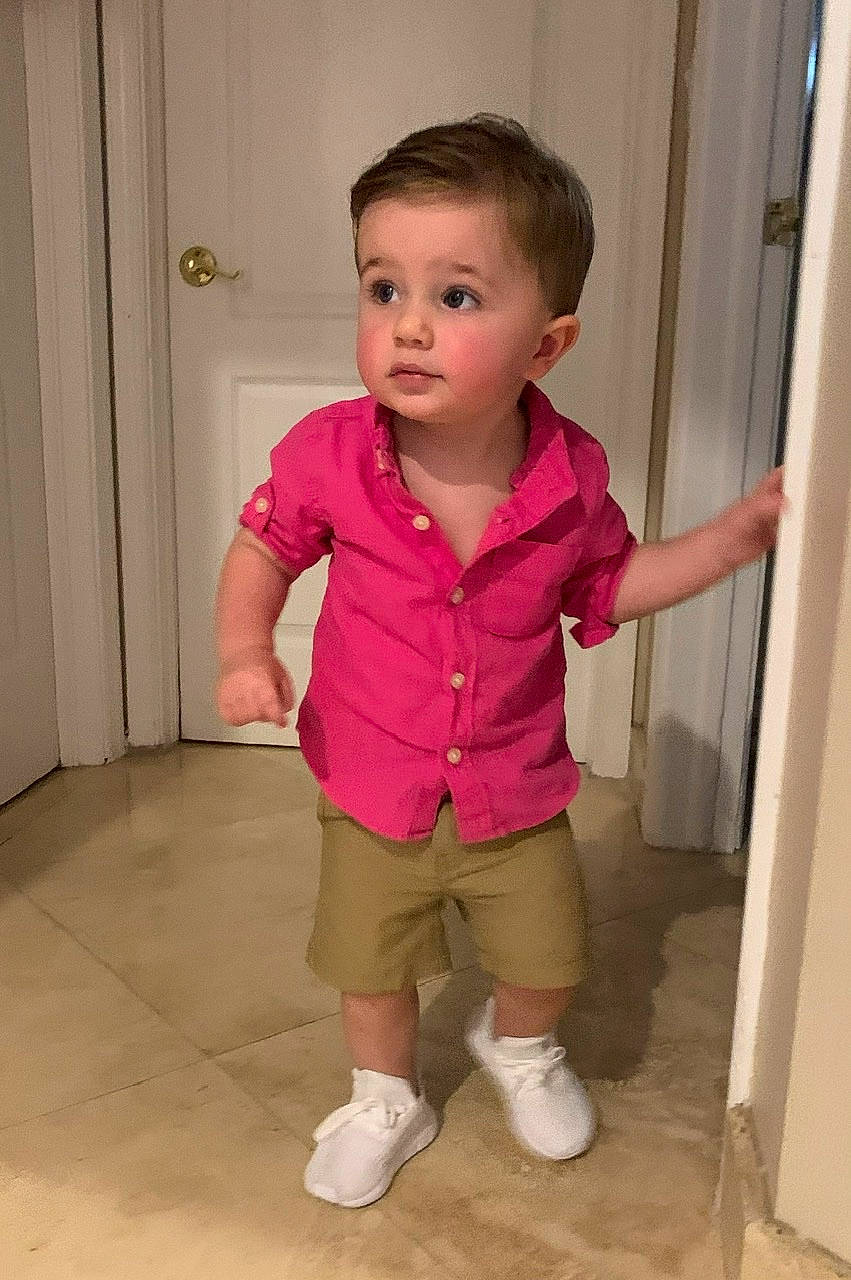 Blake joined the competition — help win amazing prizes! baby, baby_toddler_clothing, cheek, door, face, finger, flooring, hardwood, head, human_leg, knee, leg, magenta, pattern, person, pink, skin, sleeve, thumb, toddler