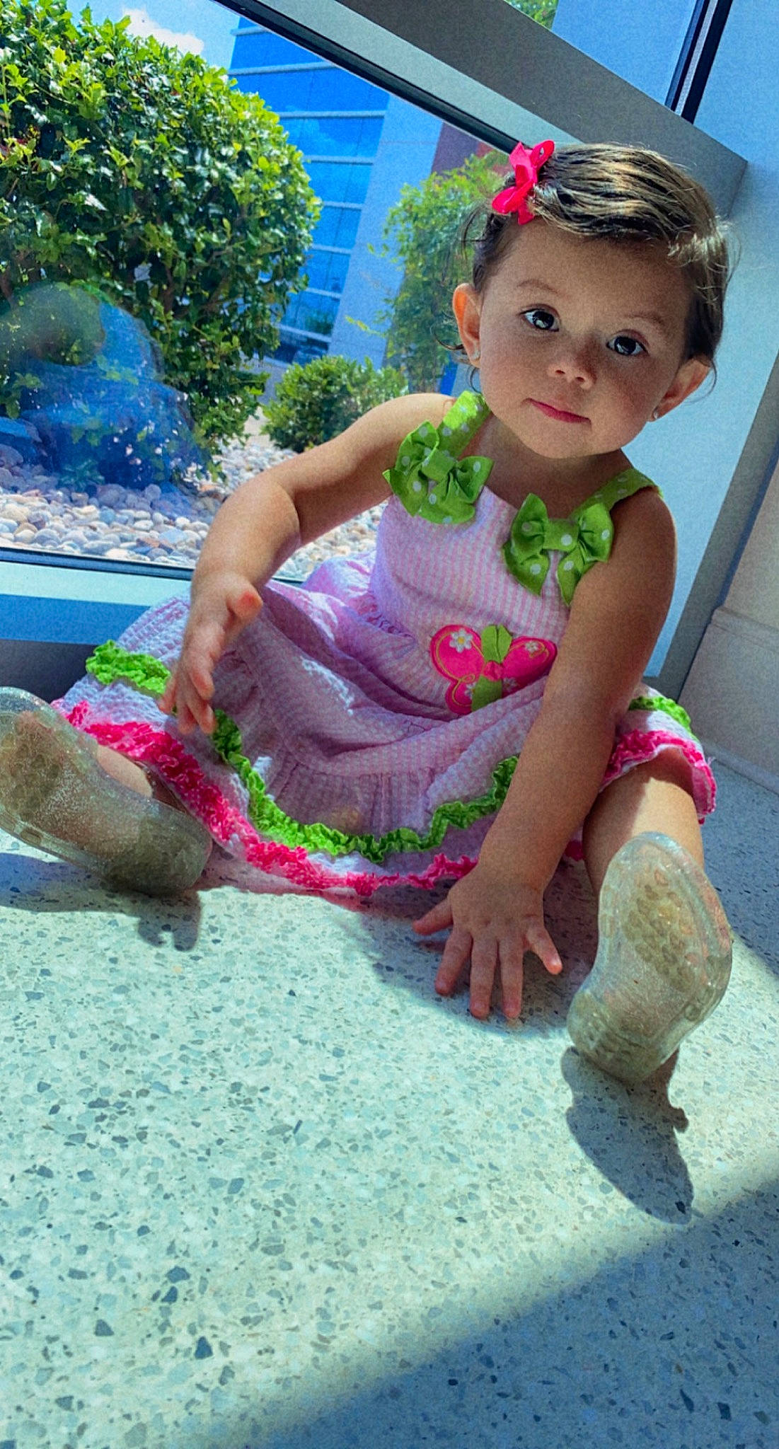 Alexa is registered to the contest to win money with this photo: baby_toddler_clothing, child, dress, foot, fun, grass, green, happy, head, human_leg, leaf, leisure, magenta, person, pink, plant, skin, summer, thigh, toddler