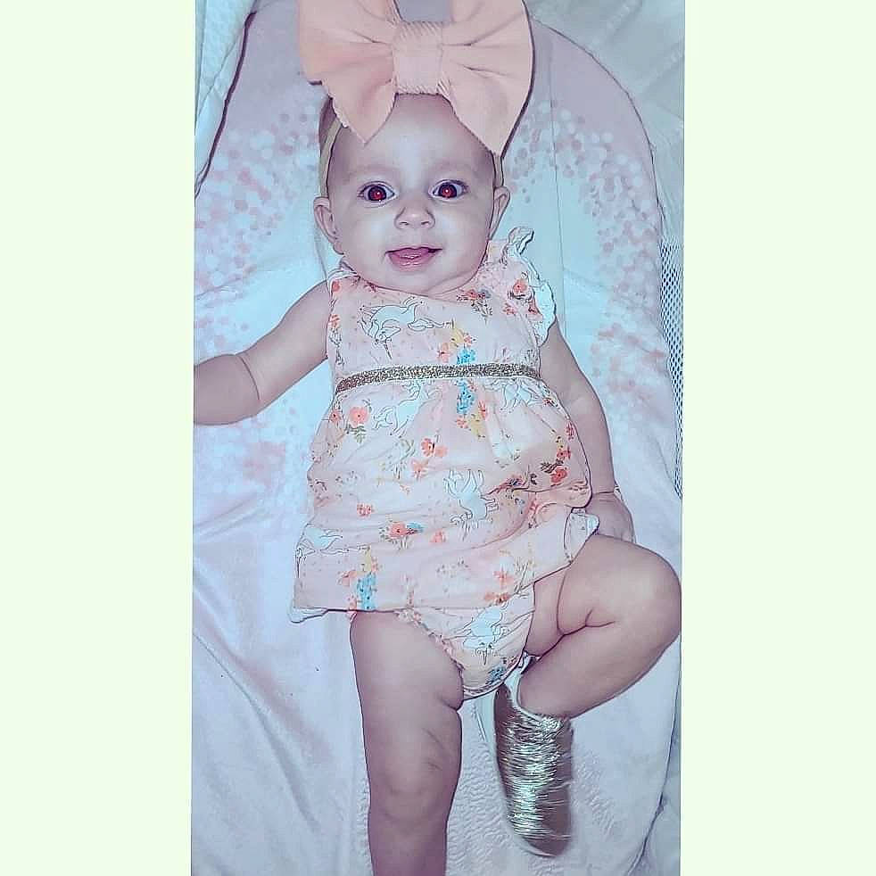 Carlie joined the competition — help win amazing prizes! baby, baby_products, baby_toddler_clothing, costume_accessory, creative_arts, day_dress, dress, embellishment, headwear, lavender, linens, one_piece_garment, pattern, peach, person, pink, product, skin, violet