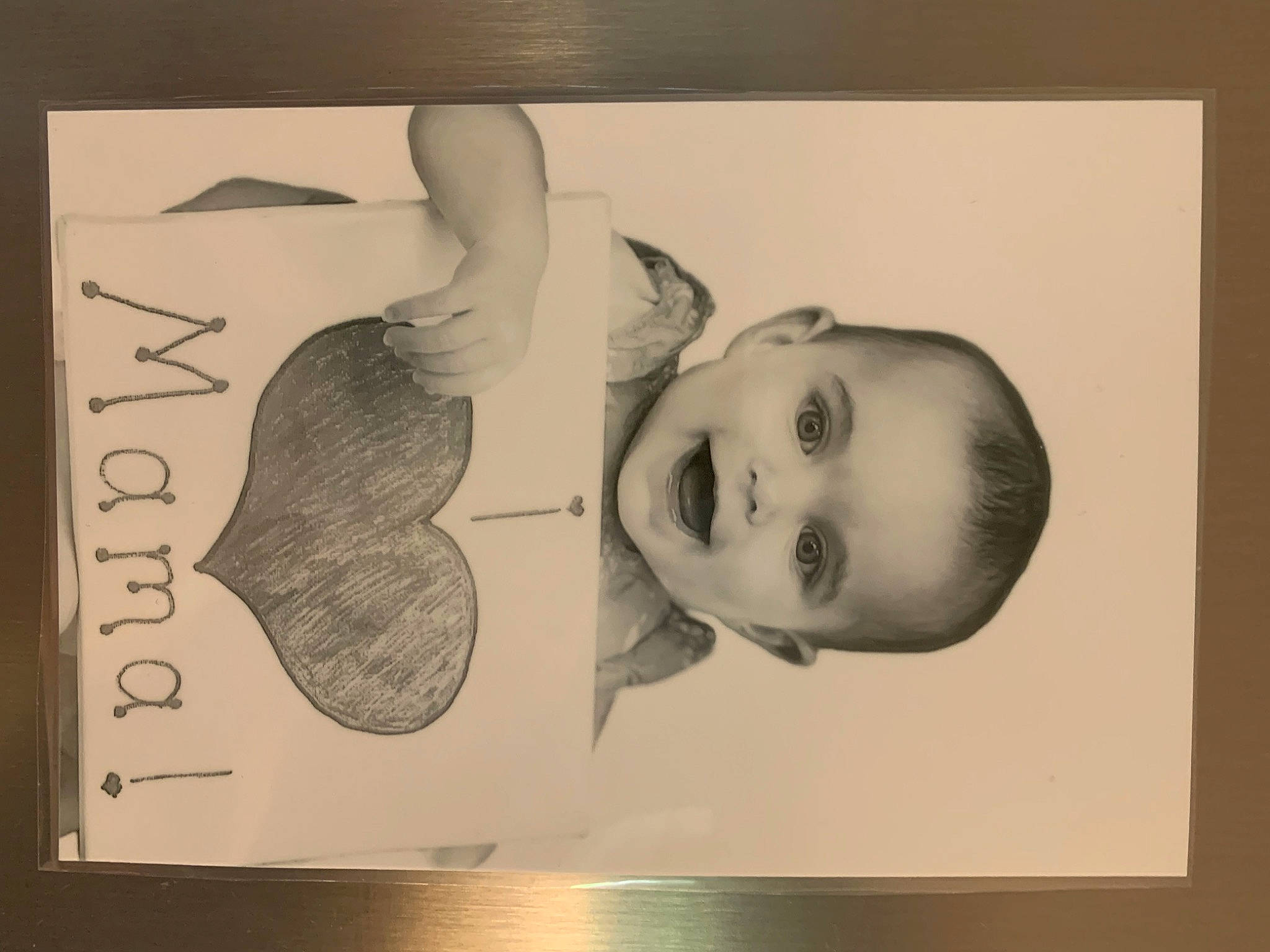 Maddison is registered to the contest to win money with this photo: art, ear, eyebrow, eyelash, font, gesture, happy, illustration, iris, jaw, monochrome, monochrome_photography, nose, person, picture_frame, rectangle, room, toddler, vintage_clothing, visual_arts