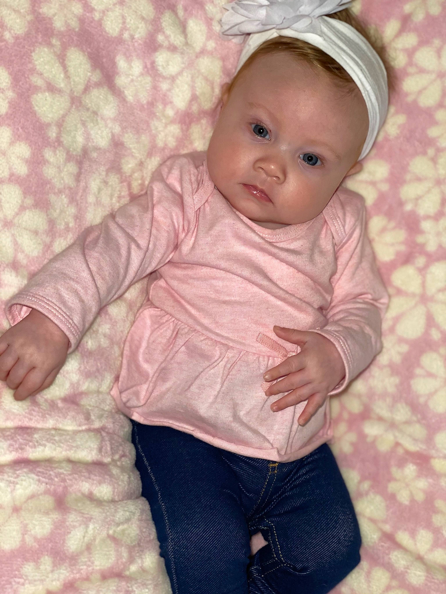 Jazelle is registered to the contest to win money with this photo: baby, baby_toddler_clothing, beige, cheek, child, child_model, eye, face, head, headgear, outerwear, person, pink, skin, sleeve, smile, toddler