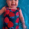 Madeline is registered to the contest to win money with this photo: baby, child, swimsuit, water, pool, smile, happy, floating, cute, summer, outdoor, skin, face, head, blue, red, pattern, wet, playful, fun