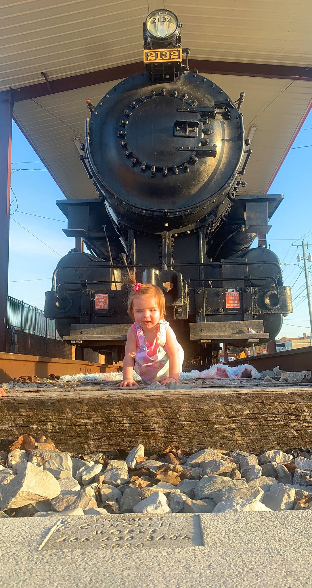 Allie joined the competition — help win amazing prizes! asphalt, auto_part, automotive_wheel_system, fun, gas, landscape, locomotive, metal, motor_vehicle, person, railroad_car, railway, rolling, rolling_stock, sky, steam_engine, toddler, track, train, travel