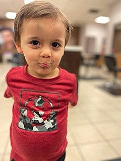 Kamerin joined the competition — help win amazing prizes! baby, baby_toddler_clothing, carmine, cheek, child, face, flooring, fun, happy, hood, long_sleeved_t_shirt, person, room, sitting, sleeve, smile, sportswear, t_shirt, toddler, top