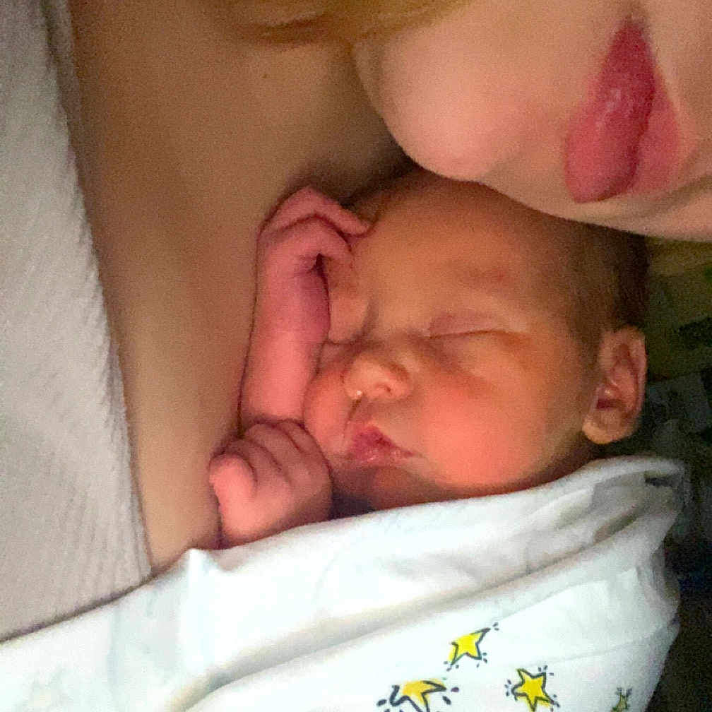 Mason is registered to the contest to win money with this photo: architecture, baby, bed, bedroom, blanket, building, cushion, face, furniture, head, homedecor, hospital, indoors, newborn, person, photography, portrait, quilt, room, sleeping