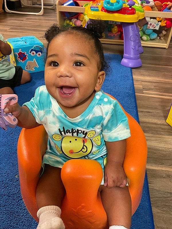 Avayah is registered to the contest to win money with this photo: baby, baby_toddler_clothing, child, flooring, fun, happy, leisure, person, photograph, recreation, shorts, skin, sleeve, smile, standing, summer, t_shirt, thigh, toddler, toy
