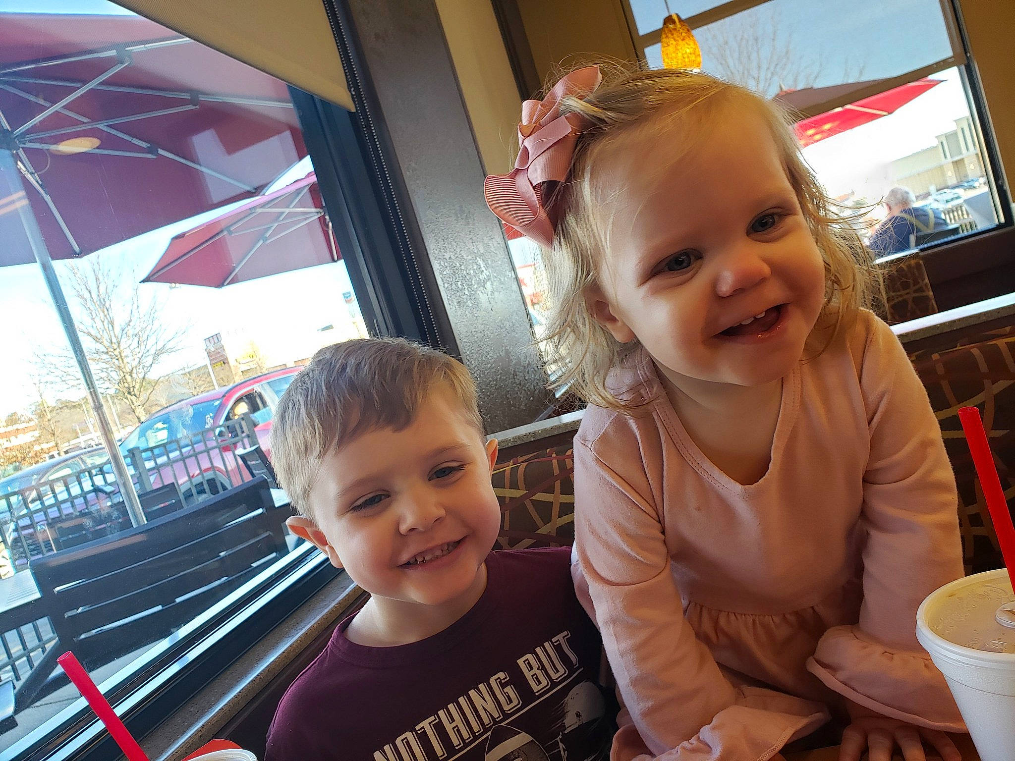 Carter is registered to the contest to win money with this photo: baby_toddler_clothing, beauty, cheek, child, chin, face, facial_expression, fun, happy, head, joy, leisure, nose, person, skin, smile, standing, t_shirt, tableware, television