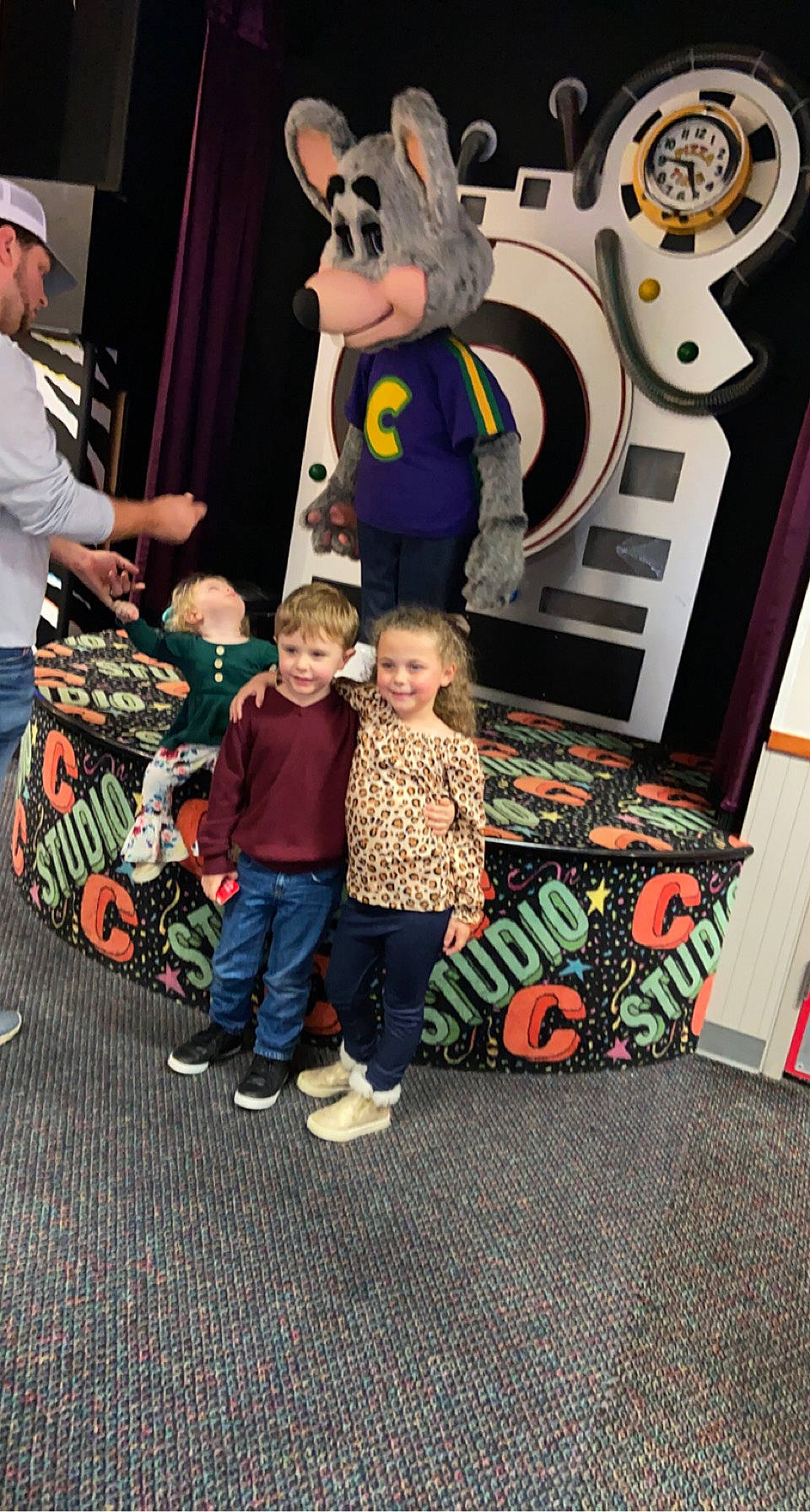 Carter is registered to the contest to win money with this photo: black, boot, child, costume, couch, event, fictional_character, flooring, fun, holiday, joy, mammal, person, product, room, shorts, smile, snapshot, t_shirt, toddler