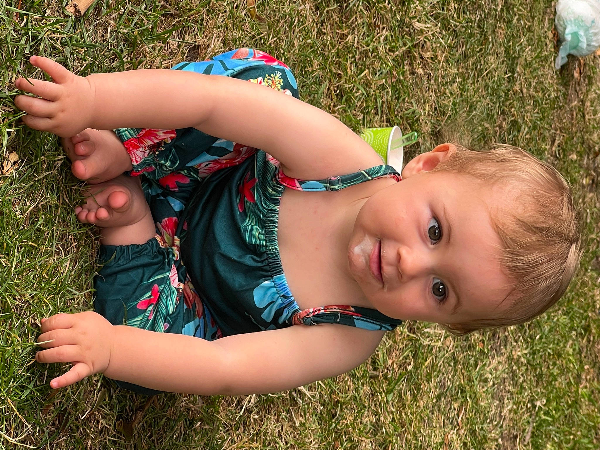 Brooke joined the competition — help win amazing prizes! blond, child, fun, grass, grassland, happy, human_leg, lawn, leaf, leisure, meadow, pattern, people_in_nature, person, plant, play, prairie, sitting, smile, toddler