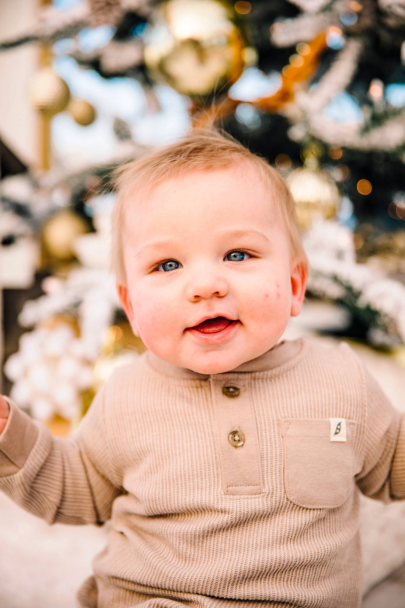 Kade joined the competition — help win amazing prizes! baby, baby_toddler_clothing, blond, cheek, child, event, facial_expression, fun, happy, iris, outerwear, pattern, people, people_in_nature, person, sitting, skin, sleeve, smile, standing