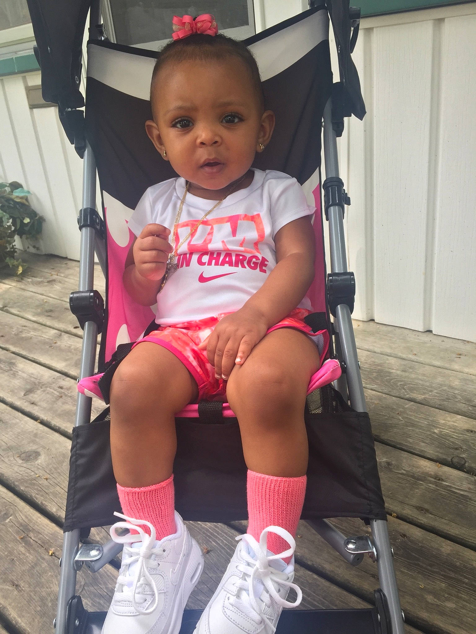 Nylah is registered to the contest to win money with this photo: abdomen, arm, baby, baby_carriage, baby_products, cheek, child, hip, human_leg, joint, knee, leg, person, pink, product, shoe, skin, swing, thigh, toddler