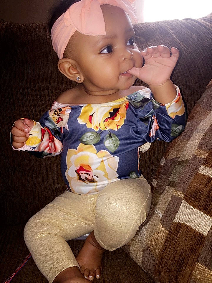 Nylah joined the competition — help win amazing prizes! baby, baby_products, cheek, child, person, play, sitting, skin, toddler, yellow