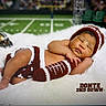 Omar joined the competition — help win amazing prizes! baby, newborn, sleeping, football, knitwear, hat, blanket, sports, helmet, field, toy, cute, child, infant, resting, pose, soft, cozy, background, portrait