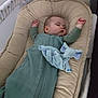 arms_up, baby, baby_nest, blanket, child, cozy, cushion, cute, elephant, face, green_sleeping_sack, indoor, infant, nursery, peaceful, plush_toy, resting, sleeping, soft_toy, young_child
