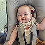 Kézio a rejoint le concours — aidez-le/la à gagner de superbes lots ! arm, baby, baby_seat, bib, child, clothing, cushion, cute, face, furniture, happy, head, home, indoor, infant, person, plush_toy, seatbelt, skin, smiling