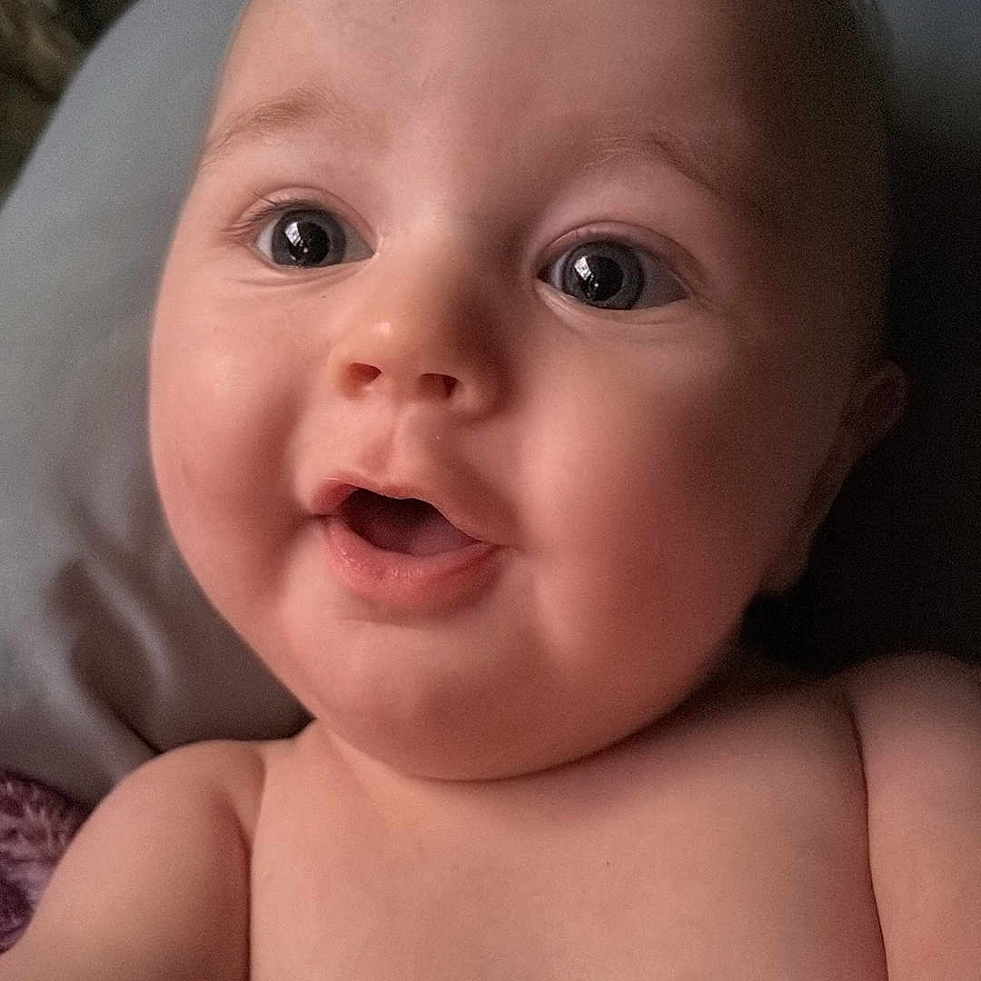 Jaeger is registered to the contest to win money with this photo: adorable, baby, bare_shoulders, cheeks, child, closeup, cute, expression, eyes, face, hair, head, human, infant, mouth, person, portrait, skin, soft_lighting, young