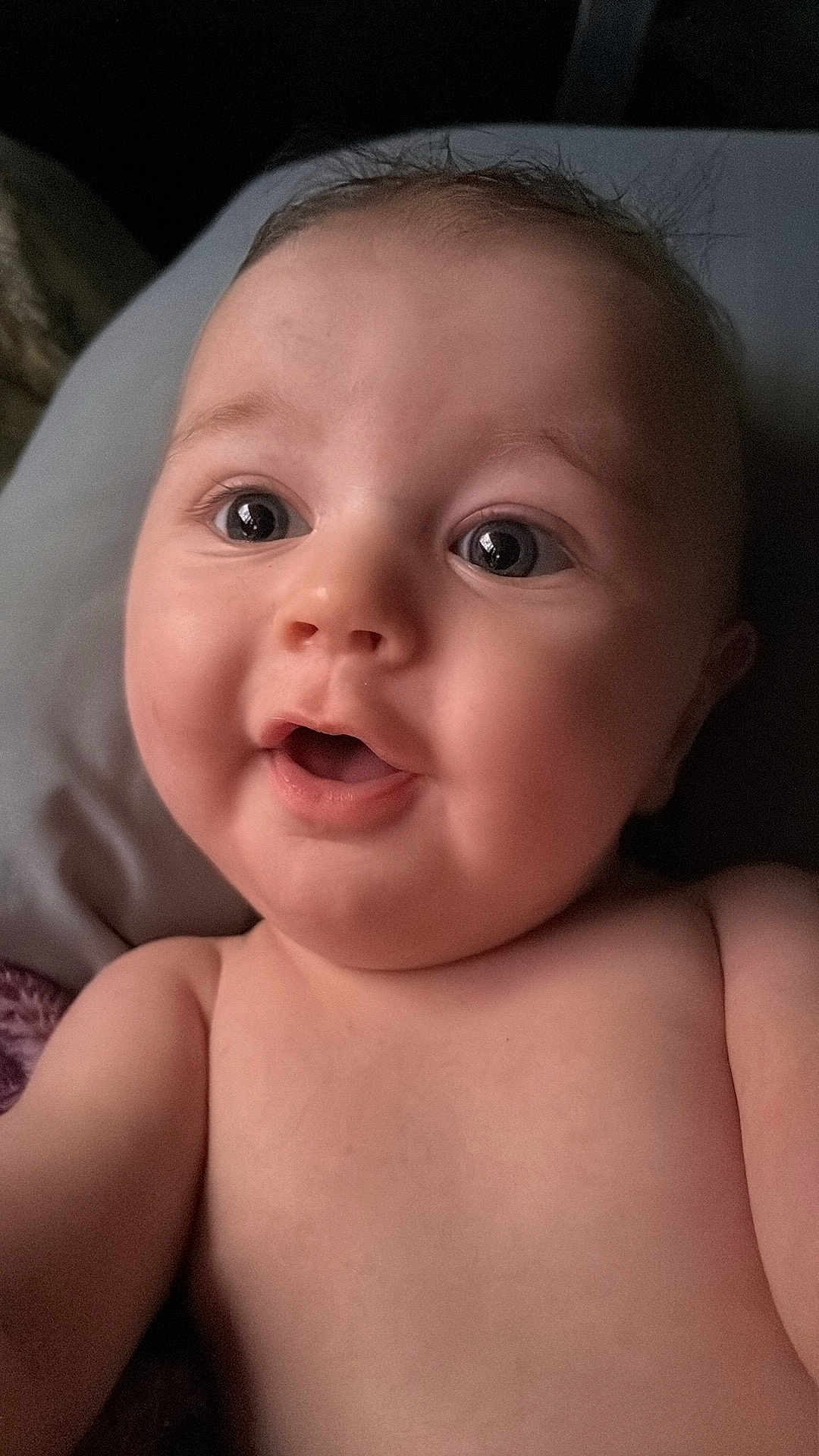 Jaeger is registered to the contest to win money with this photo: baby, infant, face, skin, eyes, mouth, expression, closeup, portrait, child, cute, adorable, young, human, person, head, cheeks, hair, bare_shoulders, soft_lighting
