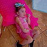 Sarah is registered to the contest to win money with this photo: child, toddler, girl, sitting, pink_outfit, hair_bow, sneakers, cushion, floor, tile, indoor, portrait, fashion, sparkles, pet_pad, pet_bowls, home, casual, relaxed, playful