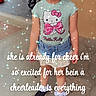 Sarah is registered to the contest to win money with this photo: child, girl, portrait, standing, smiling, pink_bow, hello_kitty, t_shirt, denim_shorts, cheerleader, sparkles, glitter_effect, backyard, patio, chair, fence, swimming_pool, social_media, text_overlay, edited_photo