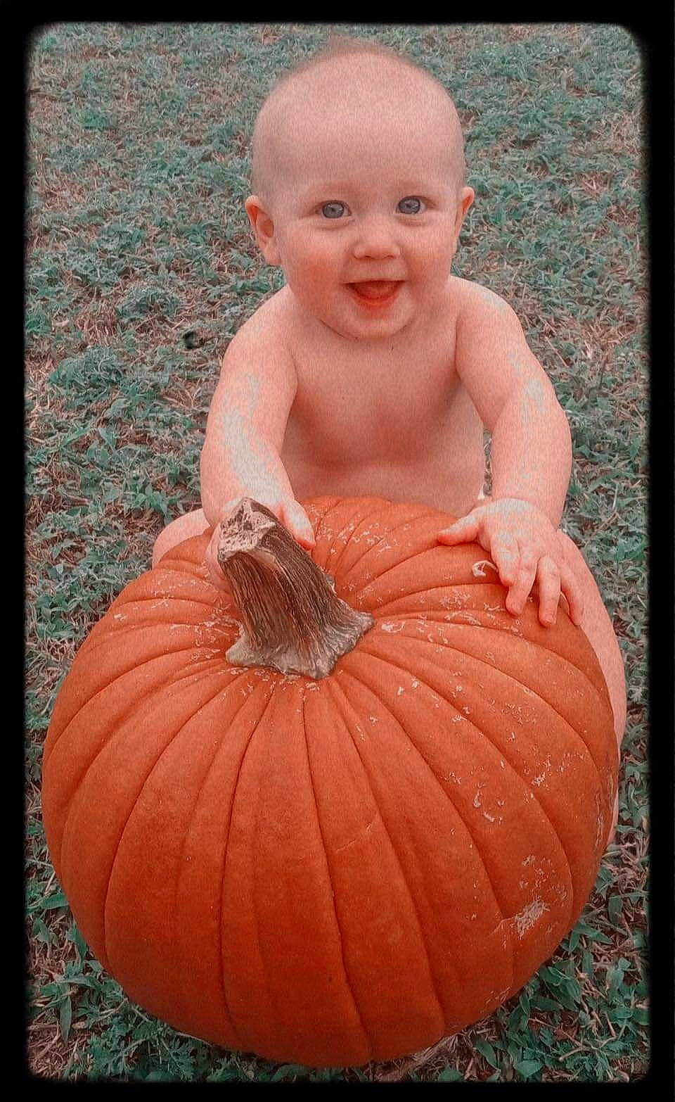 River joined the competition — help win amazing prizes! art, calabaza, child, cucurbita, dress, eye, face, gourd, happy, head, joy, natural_foods, orange, person, plant, pumpkin, sitting, smile, squash, vegetable