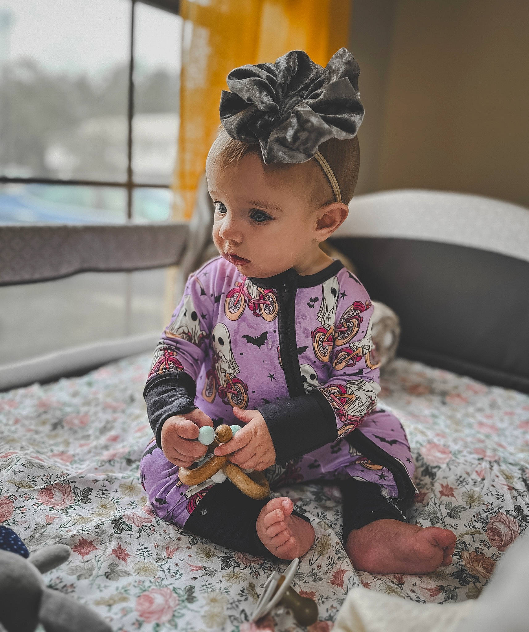 November joined the competition — help win amazing prizes! baby, baby_toddler_clothing, child, comfort, costume, doll, eye, eyelash, fashion_accessory, fashion_design, headpiece, jewellery, magenta, pattern, person, purple, room, sitting, sleeve, toddler