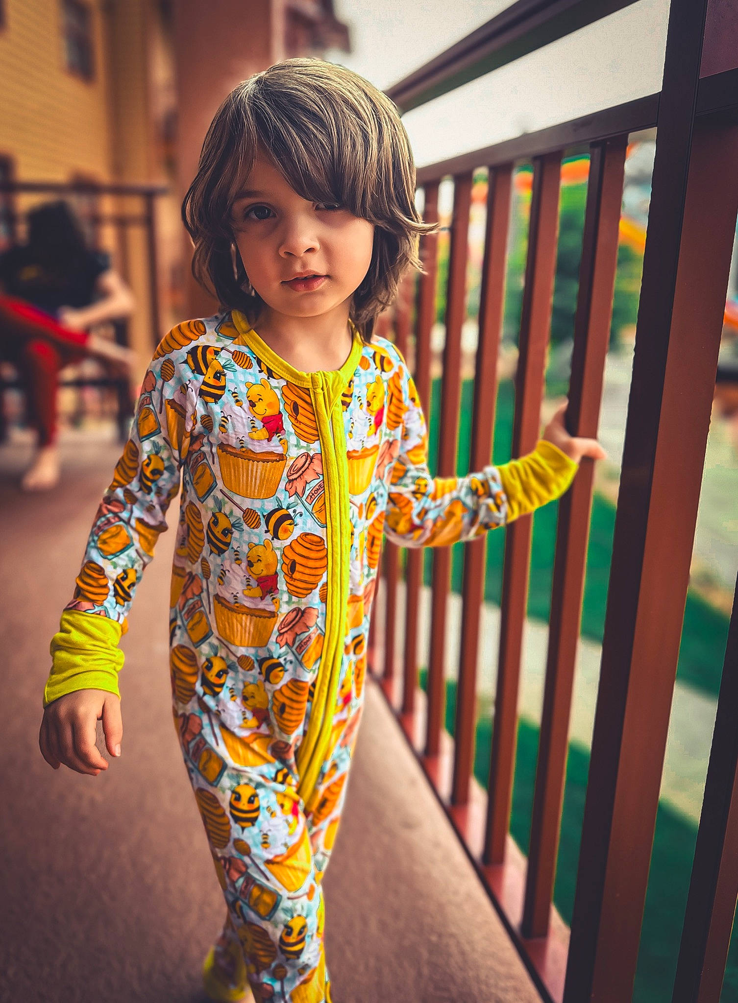 Roman is registered to the contest to win money with this photo: baby_toddler_clothing, child, electric_blue, fashion_design, fun, happy, human_leg, leisure, magenta, pattern, people_in_nature, person, play, shoulder, sitting, sleeve, standing, t_shirt, textile, toddler