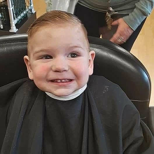 Deegan is registered to the contest to win money with this photo: baby, buzz_cut, cheek, child, chin, ear, eyebrow, face, facial_expression, forehead, hair, hairstyle, head, joy, laugh, nose, person, skin, smile, toddler