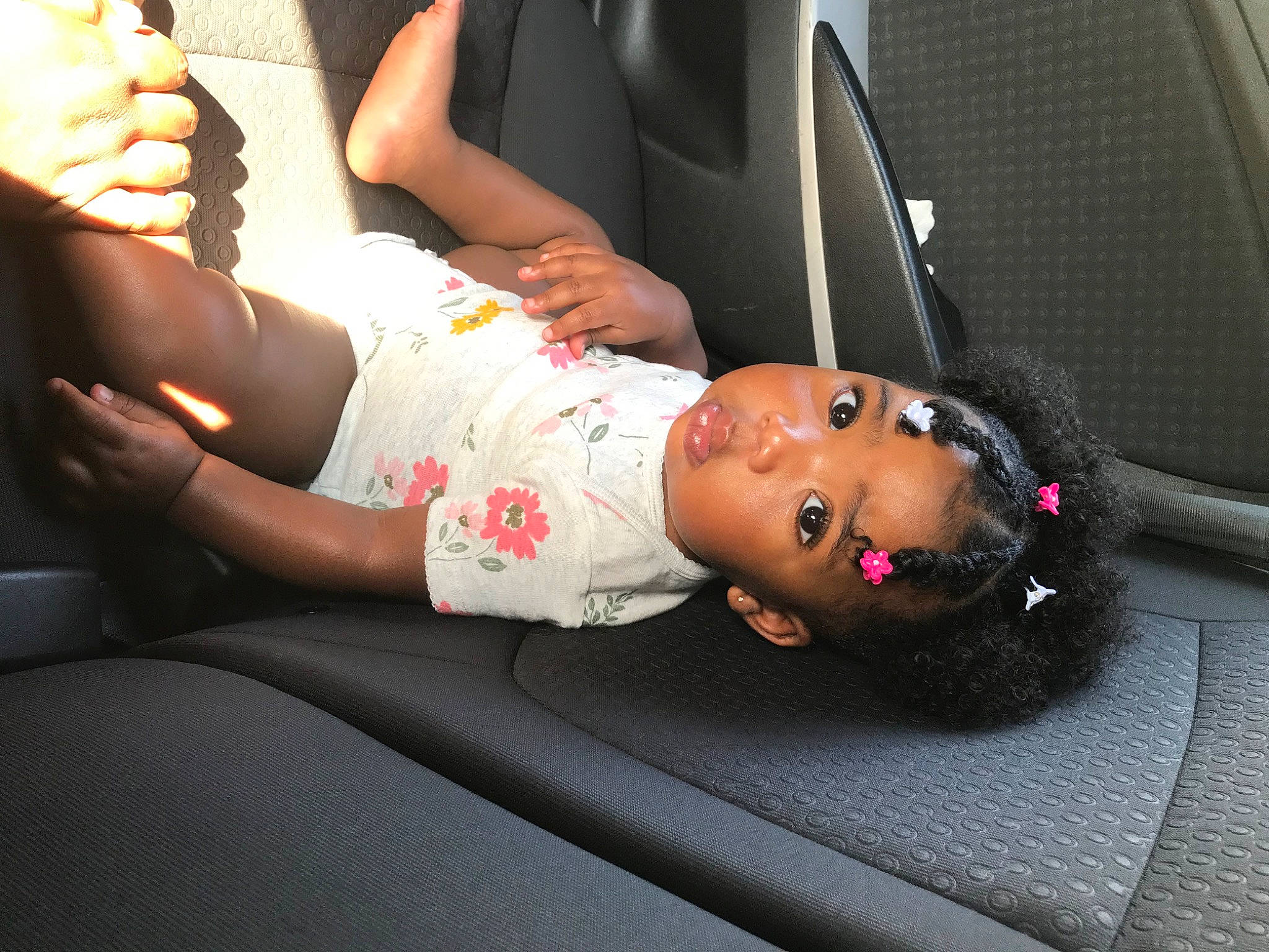 Nezariah is registered to the contest to win money with this photo: automotive_design, automotive_exterior, beauty, black_hair, car, car_seat, car_seat_cover, comfort, dress, eyewear, fashion, hand, human_leg, joint, knee, motor_vehicle, person, surprise, thigh, vehicle
