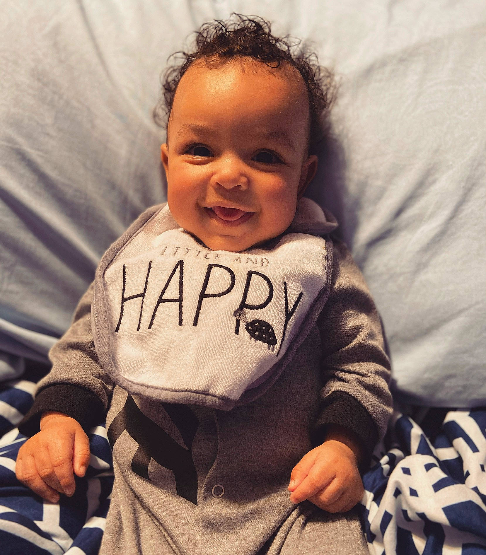 Ermias joined the competition — help win amazing prizes! baby, baby_laughing, baby_products, baby_toddler_clothing, child, comfort, facial_expression, laugh, long_sleeved_t_shirt, mouth, person, sleeve, toddler