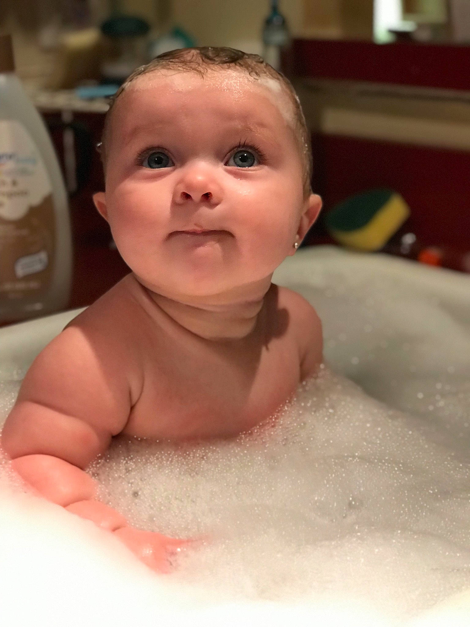 Hayven is registered to the contest to win money with this photo: baby, baby_bathing, baby_making_funny_faces, bathing, bathtub, cheek, child, face, facial_expression, foam, head, lip, mouth, nose, person, skin, smile, toddler