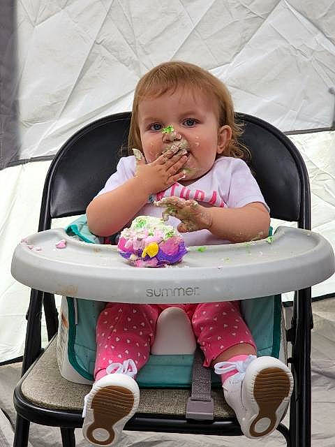 Isabella joined the competition — help win amazing prizes! arm, baby, baby_toddler_clothing, chair, child, comfort, furniture, hairstyle, head, lap, outdoor_furniture, person, pink, sharing, shoe, sitting, sneakers, sweetness, table, toddler