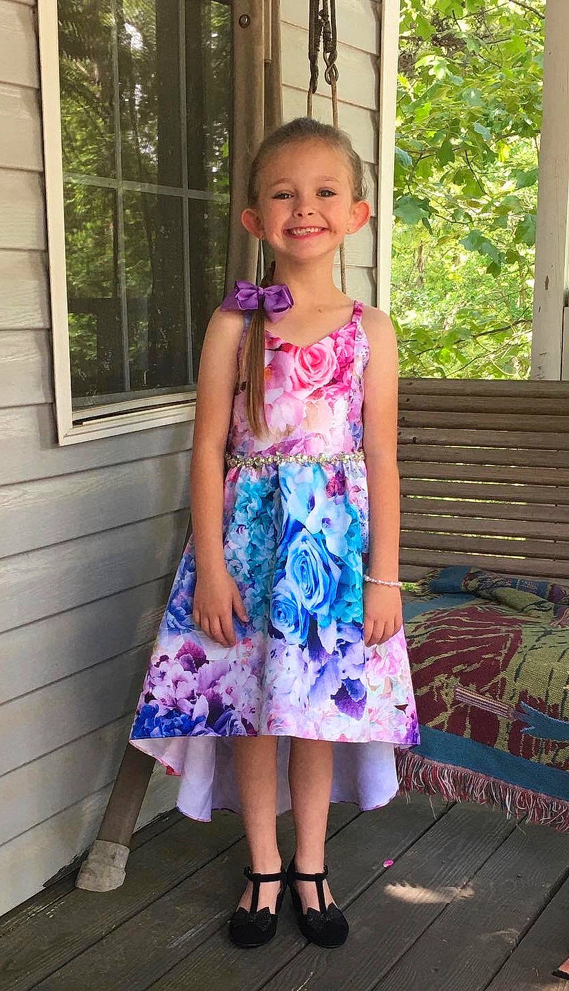 Kaitlyn joined the competition — help win amazing prizes! baby_toddler_clothing, day_dress, dress, fashion, fashion_design, high_heels, joint, joy, leg, one_piece_garment, person, pink, purple, sandal, shoulder, sleeve, smile, thigh, toddler, violet