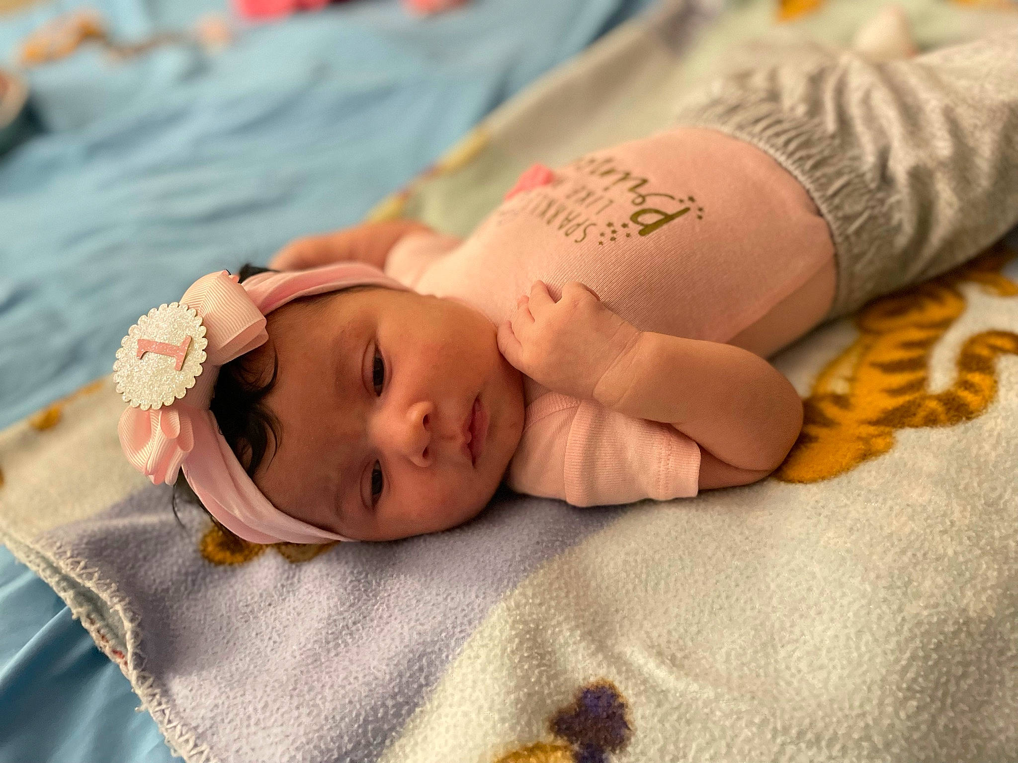 Azariah is registered to the contest to win money with this photo: abdomen, arm, baby, baby_sleeping, baby_toddler_clothing, child, comfort, elbow, eye, finger, hand, hat, headwear, joint, linens, mammal, nail, person, skin, textile