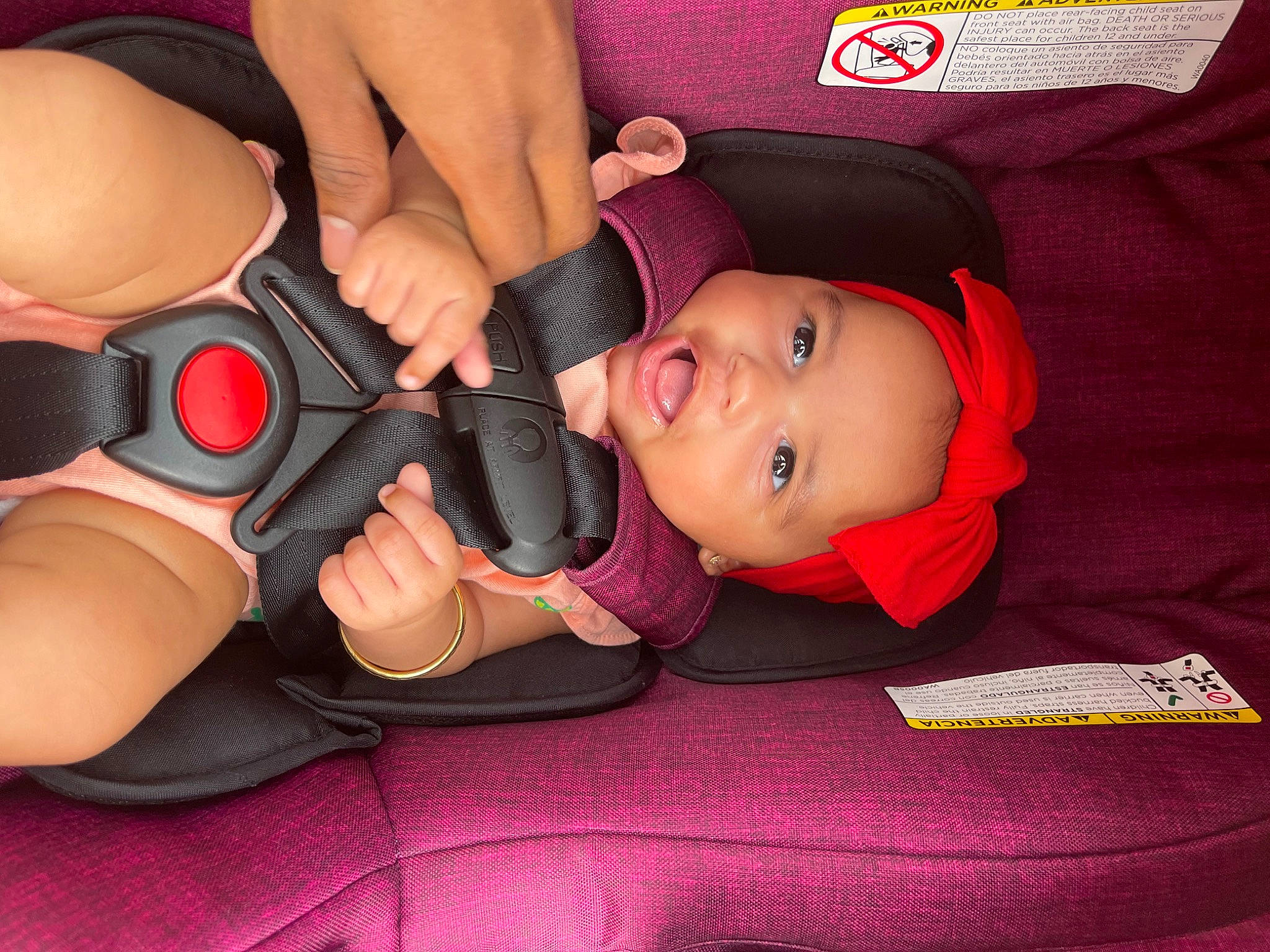 Kimora joined the competition — help win amazing prizes! baby, baby_toddler_clothing, child, comfort, eye, eyelash, finger, fun, gesture, hand, hat, headwear, joint, mouth, nail, person, pink, red, skin, thumb