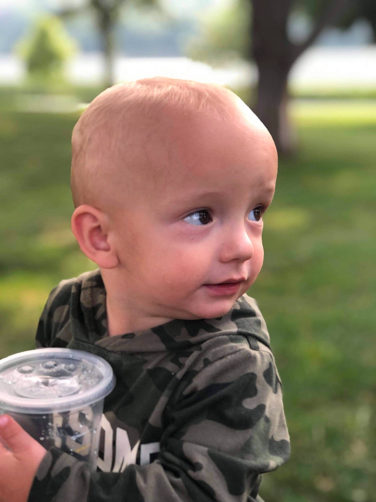 Desmond joined the competition — help win amazing prizes! aluminum_can, baby, baby_toddler_clothing, beverage_can, buzz_cut, cheek, child, fun, garden, grass, happy, lawn, pattern, person, personal_protective_equipment, plant, portrait_photography, sitting, t_shirt, tin_can