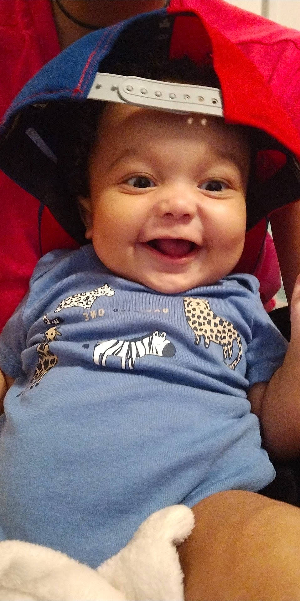 Lorenzo joined the competition — help win amazing prizes! baby, cap, child, chin, electric_blue, eye, facial_expression, fashion_accessory, fun, gesture, happy, hat, headgear, headwear, helmet, leisure, person, personal_protective_equipment, skin, sleeve