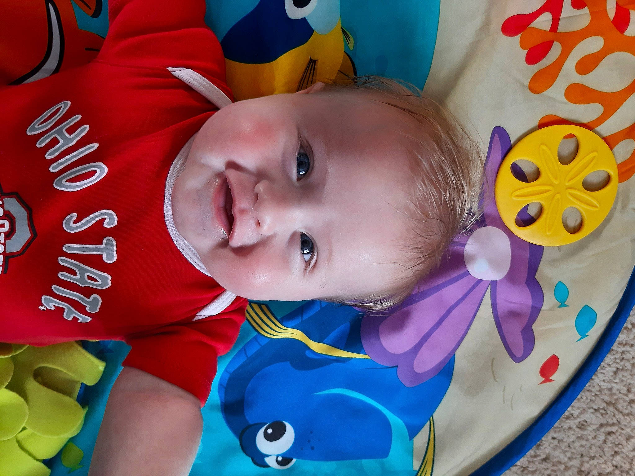 Graham is registered to the contest to win money with this photo: baby, baby_products, baby_toddler_clothing, blue, cheek, child, eye, fun, happy, iris, mouth, organ, person, pink, product, skin, smile, snapshot, textile, toddler