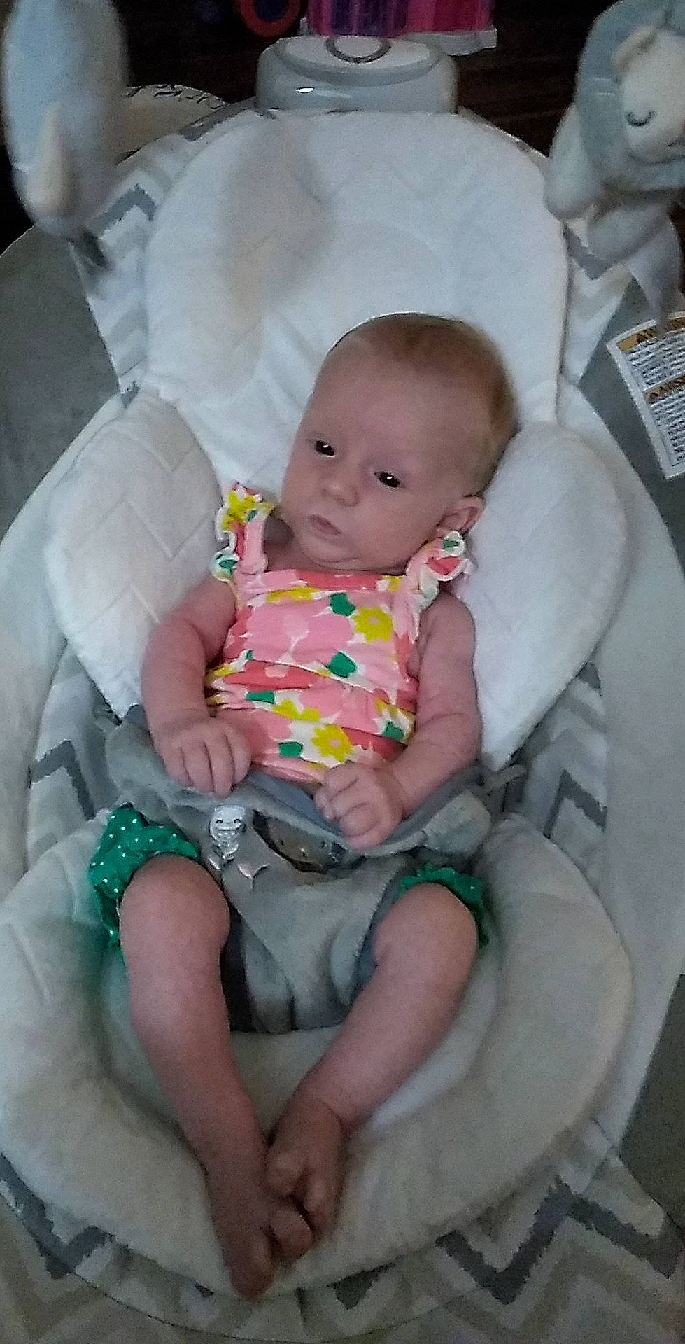 Emma Rae Gilbert is registered to the contest to win money with this photo: abdomen, baby, baby_products, baby_toddler_clothing, cheek, child, comfort, finger, human_leg, lap, linens, person, pink, sitting, skin, sock, thigh, toddler