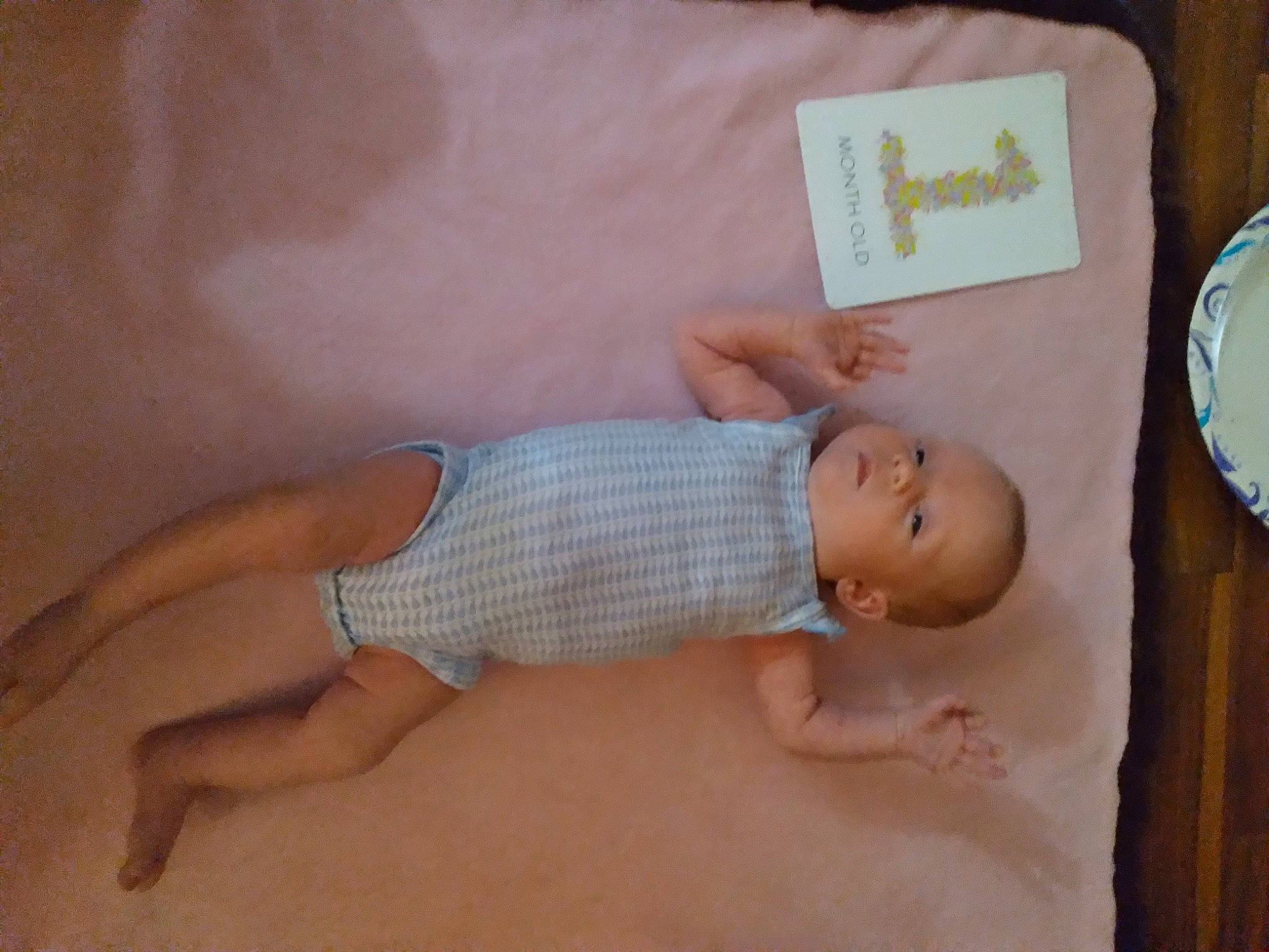 Emma Rae Gilbert is registered to the contest to win money with this photo: abdomen, baby, baby_products, baby_sleeping, baby_toddler_clothing, barefoot, bedtime, child, comfort, diaper, finger, foot, human_leg, linens, pattern, person, room, skin, thigh, toddler