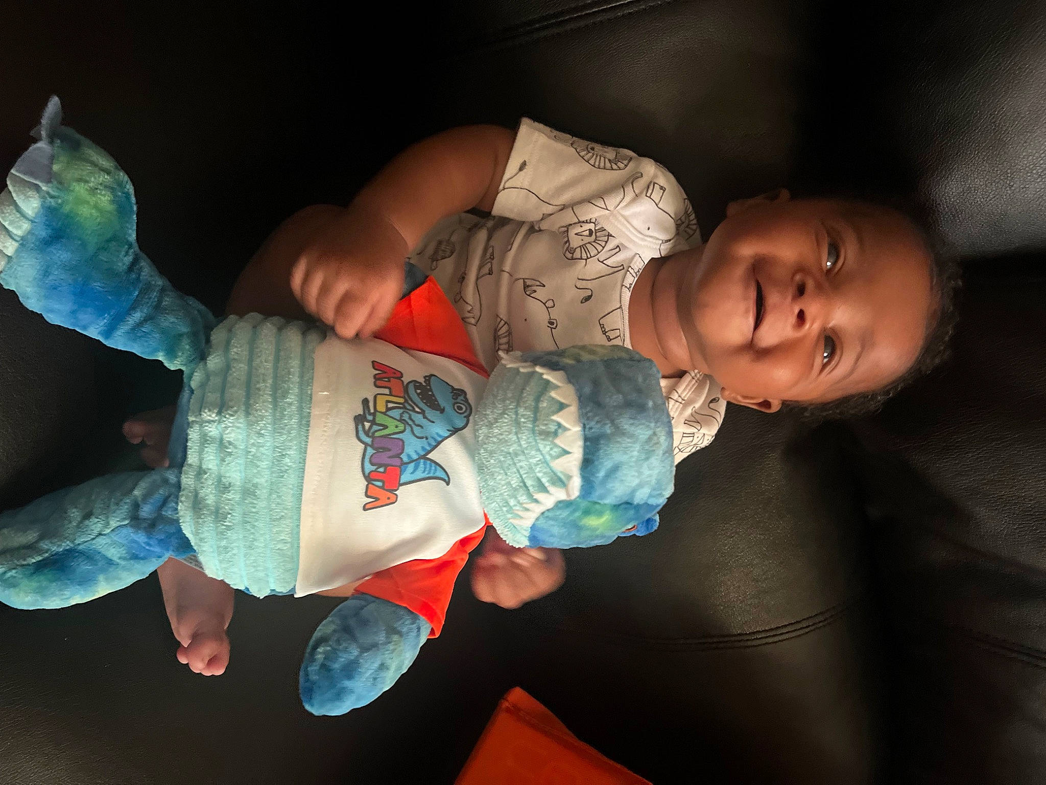 Kamarion joined the competition — help win amazing prizes! baby, baby_products, baby_toddler_clothing, cheek, child, comfort, gesture, happy, human, human_body, mouth, nail, people, person, sitting, skin, sleeve, textile, thumb, toddler