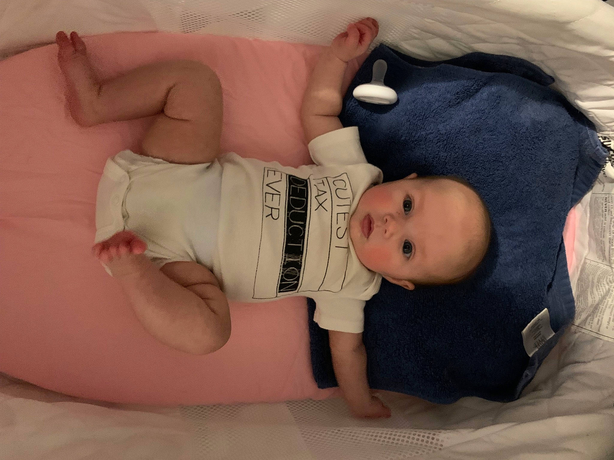 Violet is registered to the contest to win money with this photo: baby, baby_products, baby_safety, baby_sleeping, baby_toddler_clothing, cheek, child, comfort, foot, hat, headgear, human_body, linens, person, product, room, skin, sleeve, textile, thigh