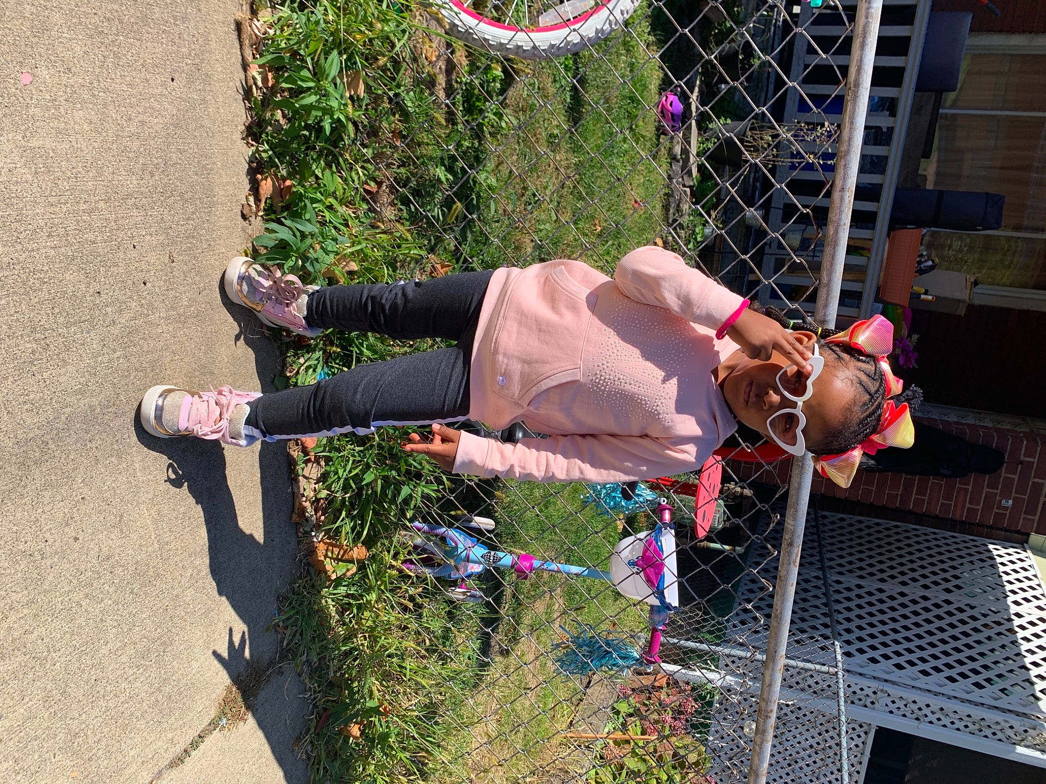 Ma Leah is registered to the contest to win money with this photo: boot, event, fence, footwear, fun, grass, human_leg, leg, leisure, mesh, people_in_nature, person, plant, recreation, shoe, shorts, sneakers, street_fashion, thigh, tree