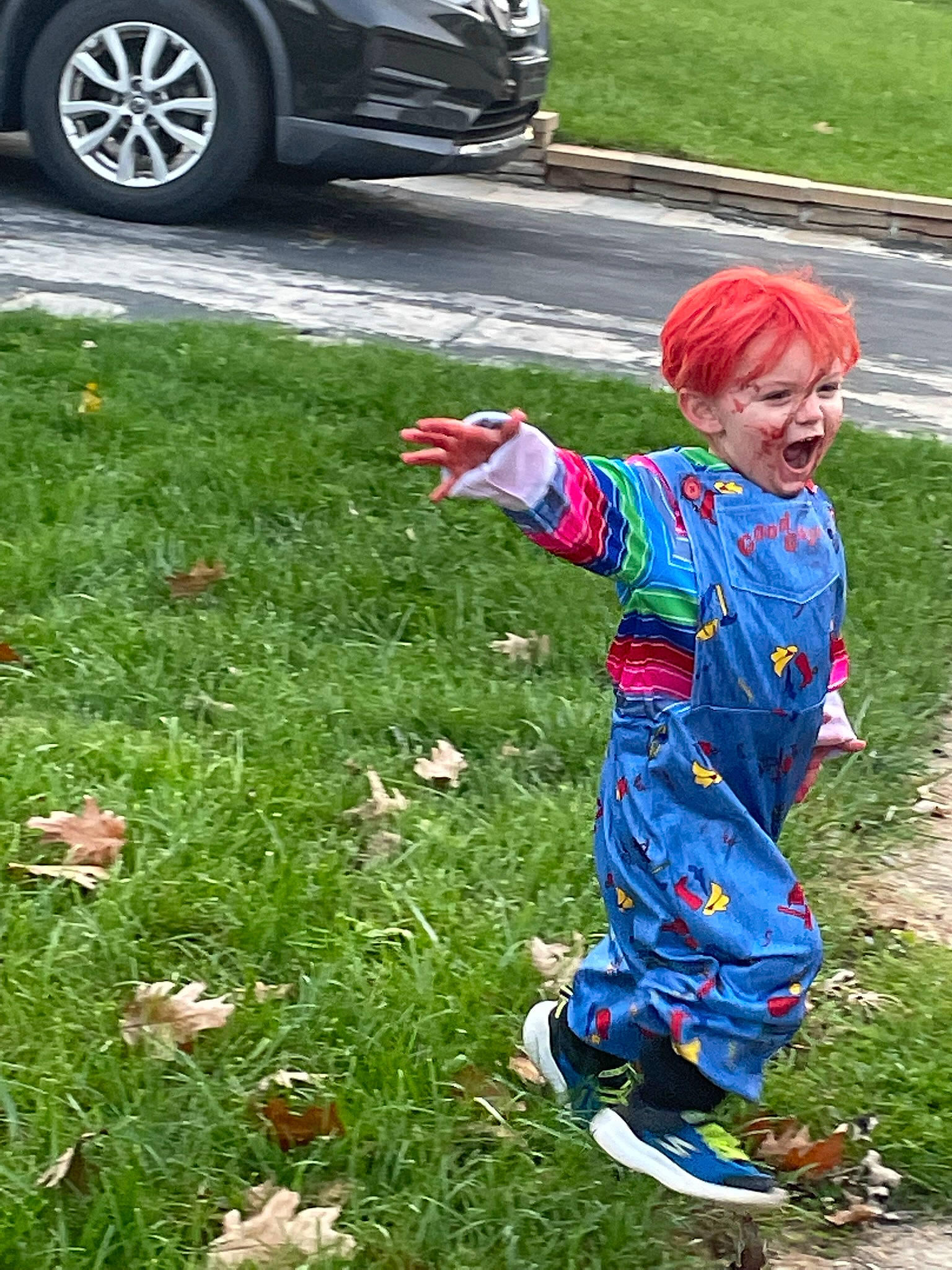 Wyatt is registered to the contest to win money with this photo: asphalt, automotive_design, automotive_exterior, automotive_lighting, automotive_tire, bumper, car, electric_blue, grass, green, headwear, lawn, motor_vehicle, person, personal_luxury_car, plant, recreation, tire, vehicle, vehicle_door