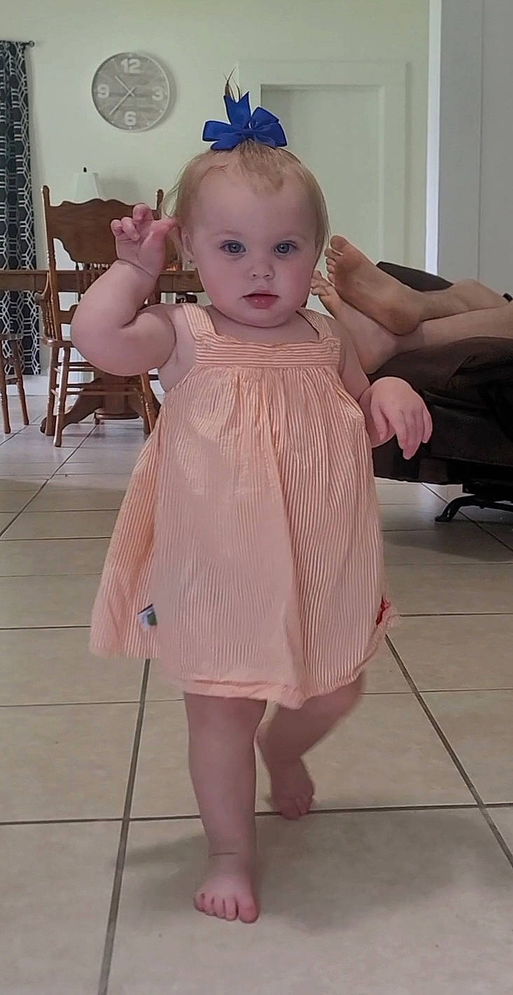 Lillith joined the competition — help win amazing prizes! baby_toddler_clothing, day_dress, dress, eye, eyelash, floor, flooring, hairstyle, head, iris, joint, knee, lip, neck, one_piece_garment, person, pink, skin, sleeve, standing