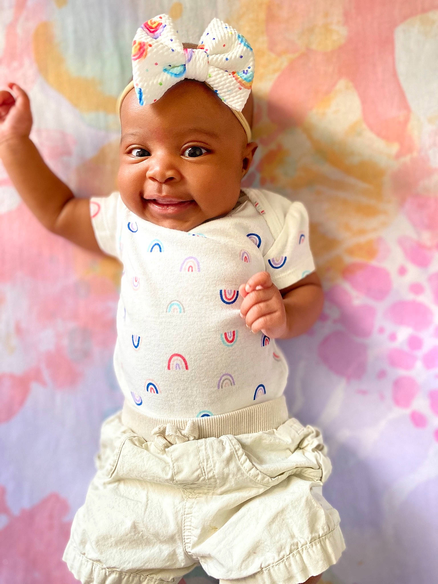 Amaziah joined the competition — help win amazing prizes! baby, baby_bloomers, baby_products, baby_toddler_clothing, child, design, hair_accessory, pattern, person, pink, product, sleeve, smile, textile, toddler