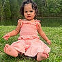 toddler, child, grass, lake, water, trees, outdoor, nature, barefoot, curly_hair, pink_clothing, summer, greenery, young_child, portrait, sitting, cute, daylight, park, casual